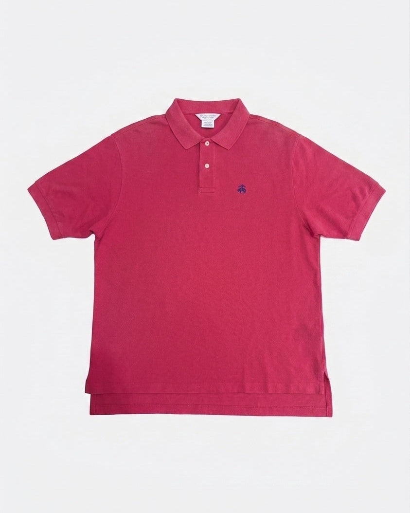 Faded magenta pink Brooks Brothers polo shirt with navy embroidered fleece logo on the left chest laid flat, front view