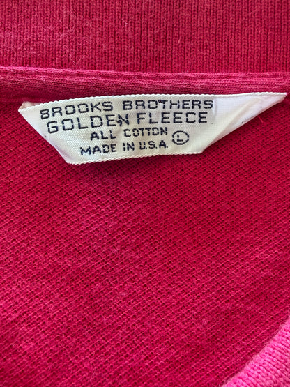 Close-up detail of the white Brooks Brothers Golden Fleece collar tag showing All Cotton, size L, Made in U.S.A.