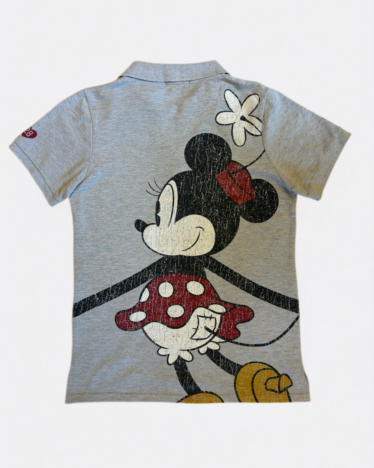 Heather grey Disney short-sleeve polo shirt with a large distressed vintage Minnie Mouse back print laid flat, back view