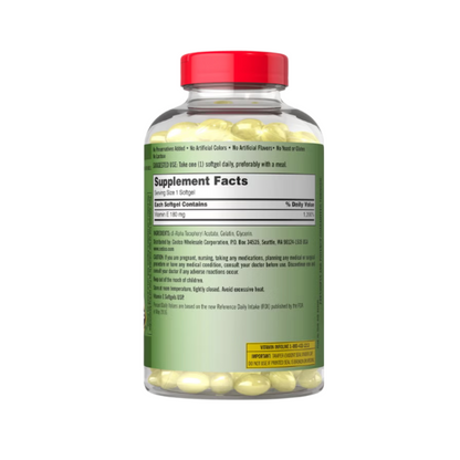 Kirkland Signature Vitamin E 180 mg 400 IU supplement bottle back view displaying supplement facts, ingredients, and usage directions.