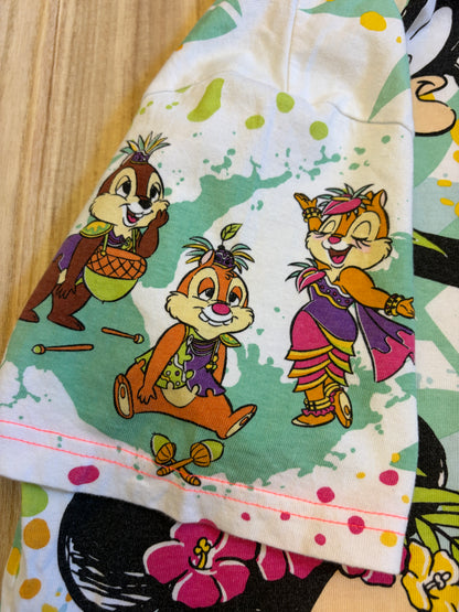 Close-up view of a short sleeve on a colorful all-over print t-shirt featuring Disney characters Chip, Dale, and Clarice in tropical outfits